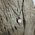 Collier Père Noël en émail rouge et blanc avec strass sur chaîne dorée