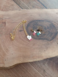 Parure moufle de Noël émail dorée - collier double chaîne et boucles d’oreilles clous colorées