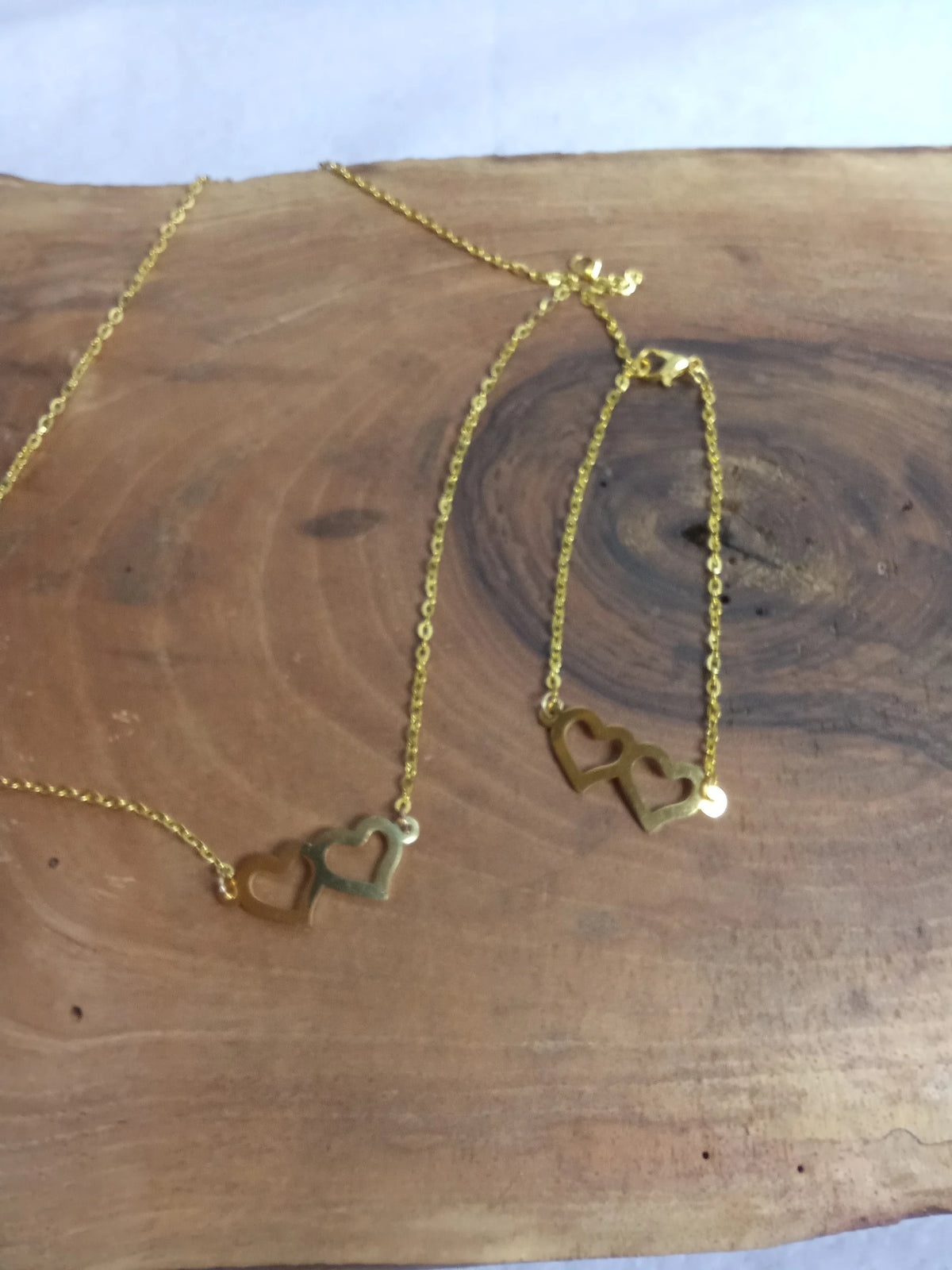Parure double cœur dorée - collier et bracelet réglable en acier inoxydable